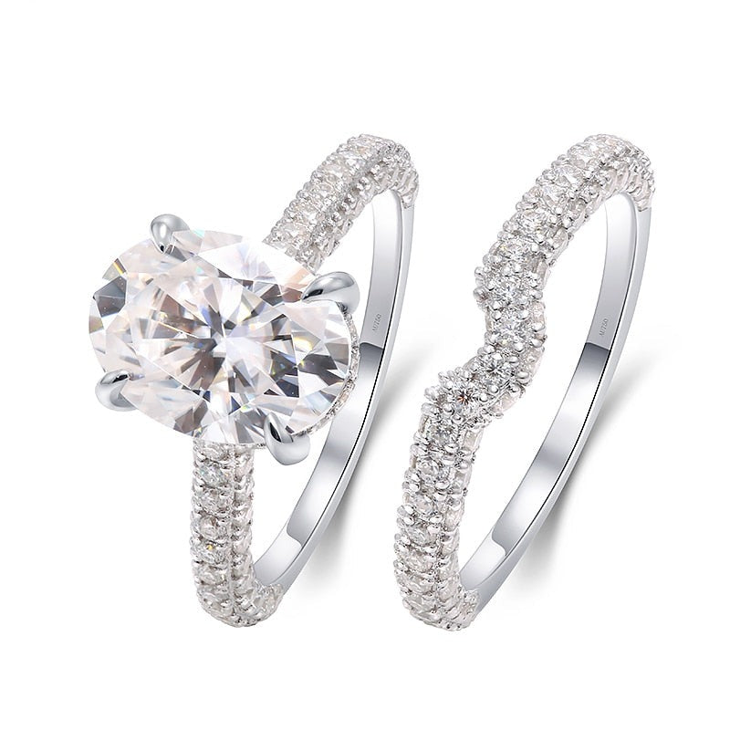 halo style oval cut moissanite ring set